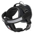 Black dog harness with top handle, removable chest plate and reflective strip. Features quick release buckle and loop patch backing for two hook and loop patches